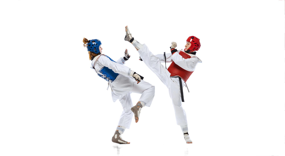 Full Length Portrait Two Professional Taekwondo Feale Athletes Fighting Isolated White Background 
